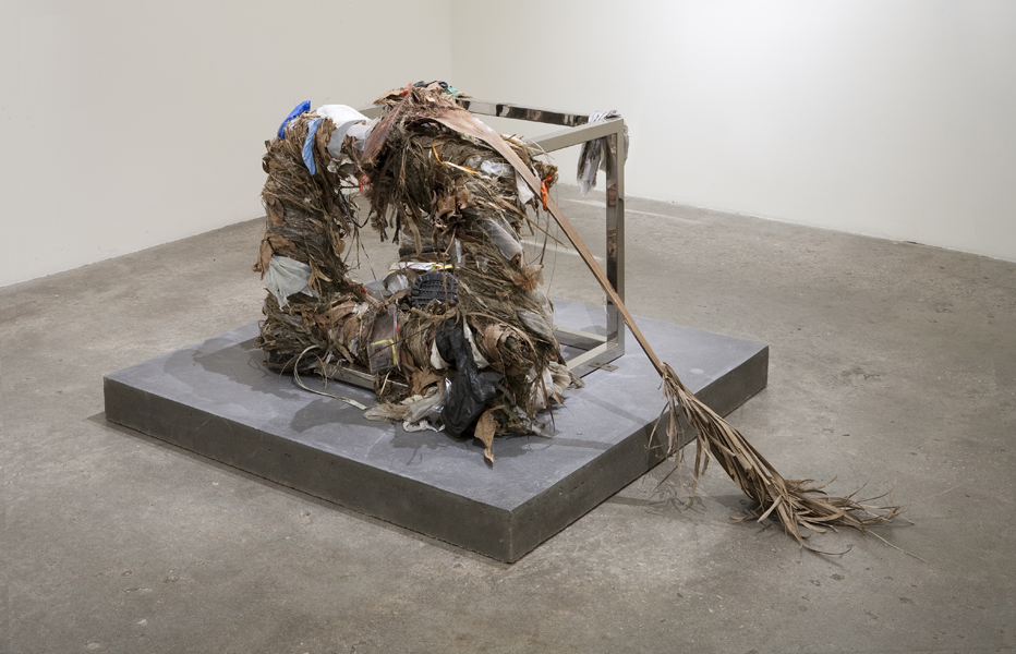 Eben Goff. Flood Cube, 2012. Chromed steel, detritus from the Los Angeles River on concrete base, 52 x 52 x 36 inches